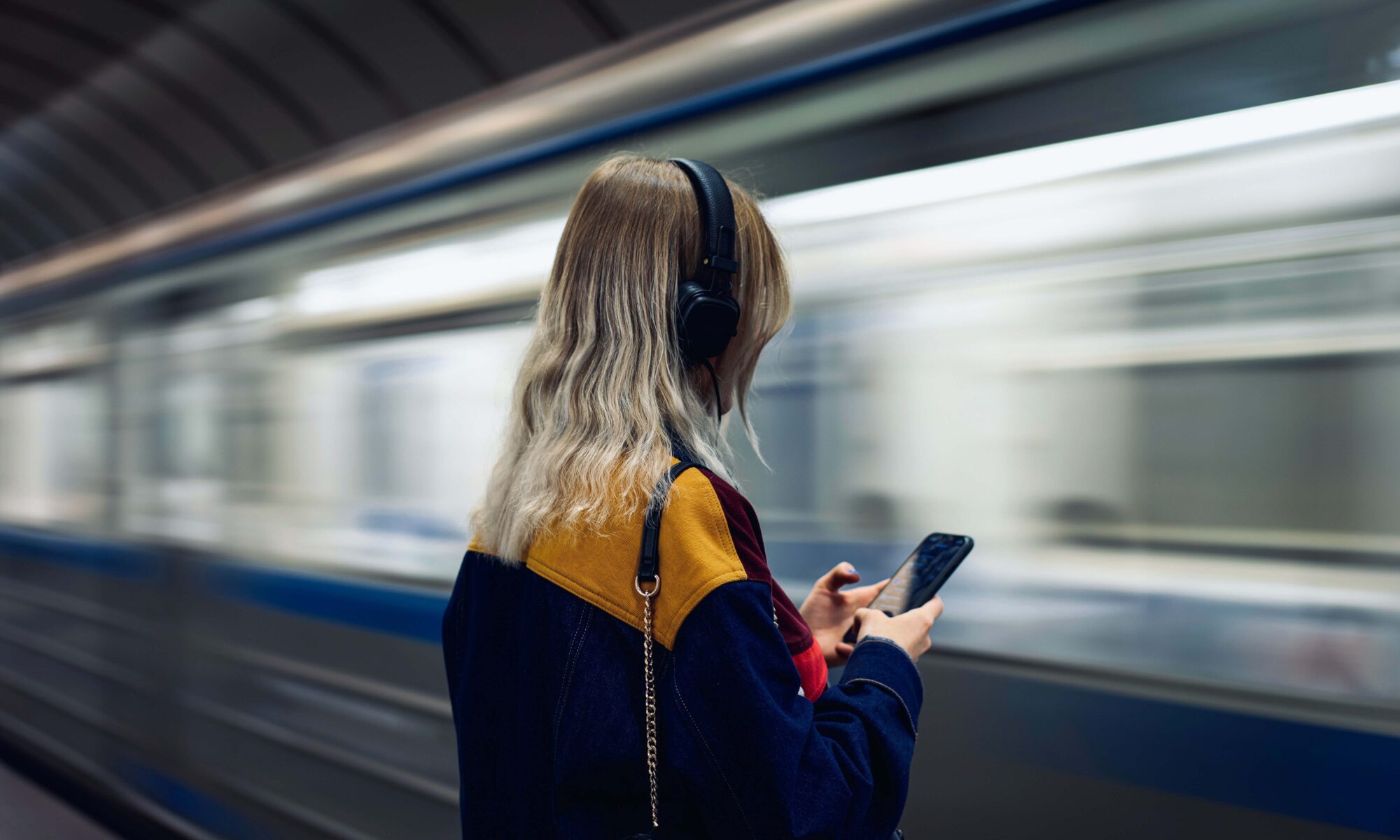 Girl waiting on a train